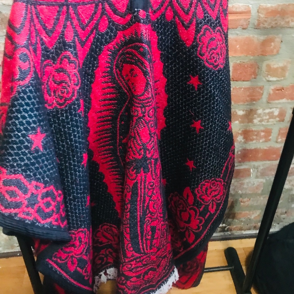 Our Lady of Guadalupe blanket poncho.